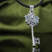 Sterling Silver Key Pendant with Bird and Flower Design