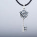 Sterling Silver Key Pendant with Bird and Flower Design