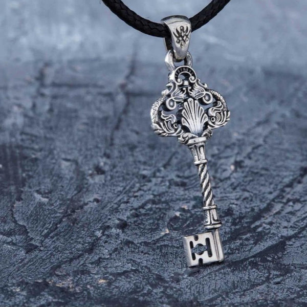 Sterling Silver Key Pendant with Shell and Fish Design
