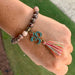 Bohemian Earth Tone Bead Bracelet with Namaste Charm and Colorful Tassel